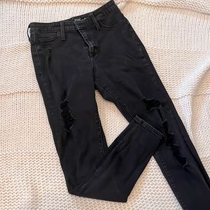 Black distressed skinny jeans